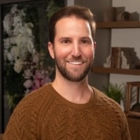 Sean Smith, CEO & ex-Head of HR, Alpas Wellness seen in a brown color tshirt
